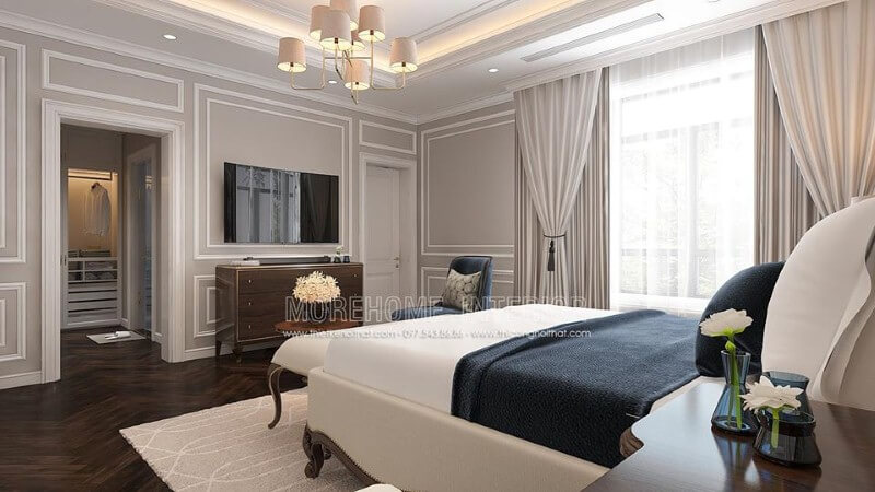 Bố trí nội thất phòng ngủ tân cổ điển có tủ quần áo đối diện giường ngủ khoa học, phong thủy. Thiết kế nội thất